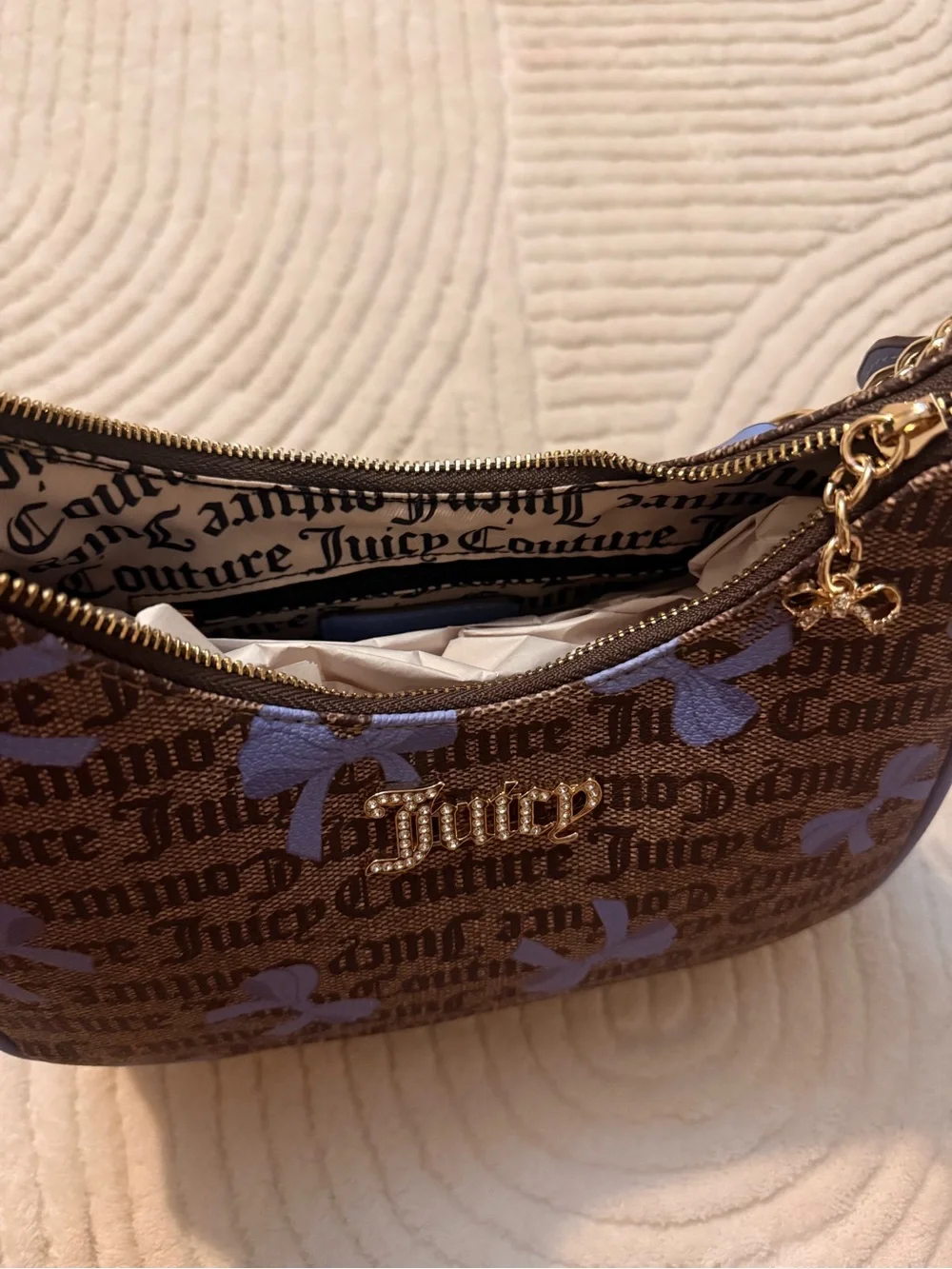 Juicy Couture Brown Monogram Shoulder Bag with Blue Bow Accents